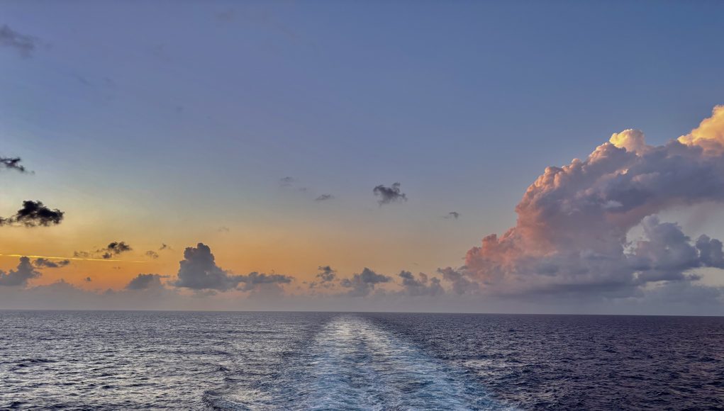 If you’re the type of traveler who prefers a panoramic view of the world you’ve just conquered rather than staring at the empty horizon ahead, an aft-facing cabin is your ultimate sanctuary.