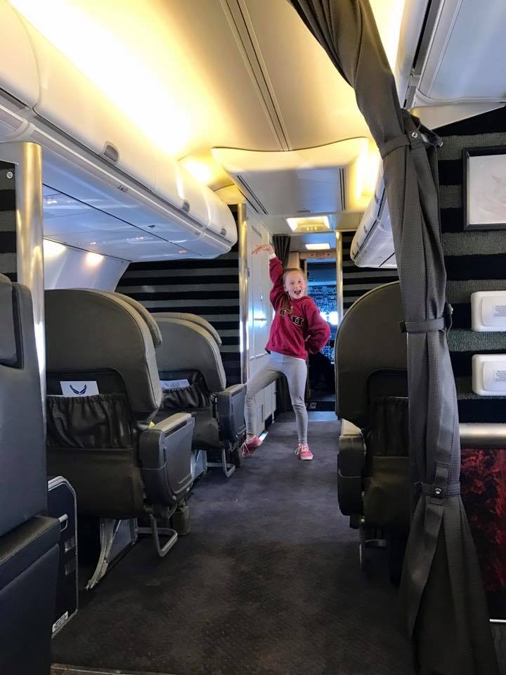 A C‑17 is the workhorse of the Air Force — a flying warehouse with the soul of a school bus. With kids, it becomes a playground of possibilities: They run laps around the cargo bay (until you stop them). They stare at the loadmasters like they’re astronauts. They marvel at the ramp, which feels like the world’s coolest back porch. They ask if they can sit in the cockpit (sometimes the answer is yes).